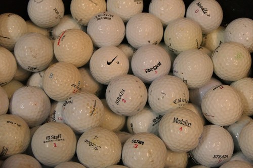 Used 100 golf balls - used,