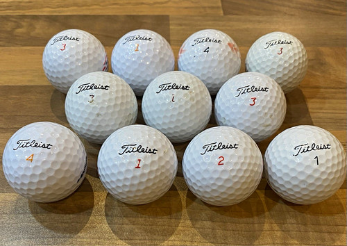 Titleist used golf balls - x,